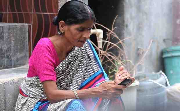 New apps from Accenture Labs and Grameen Foundation India use AI and AR technology to increase adoption of financial services.