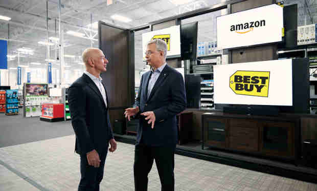 Amazon founder and CEO Jeff Bezos and Best Buy chairman and CEO Hubert Joly announce new Fire TV Edition smart TVs in Bellevue, WA.