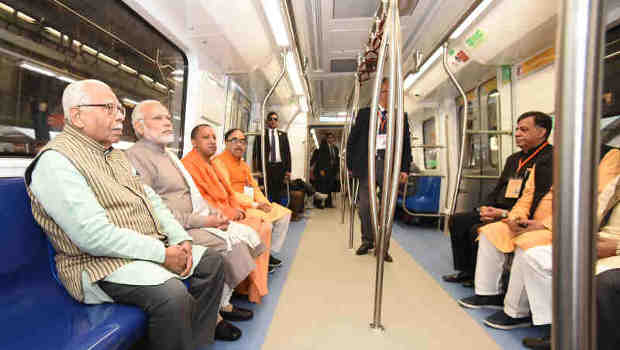 The Prime Minister, Shri Narendra Modi taking a ride in Metro from Botanical Garden Station to Okhla Bird Sanctuary along with the Governor of Uttar Pradesh, Shri Ram Naik and the Chief Minister, Uttar Pradesh, Yogi Adityanath and other dignitaries after its inauguration, at Noida, Uttar Pradesh on December 25, 2017. (file photo) Courtesy: PIB