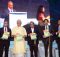 Manoj Sinha releasing the publication, at the inauguration of the India Mobile Congress - 2018, in New Delhi on October 25, 2018. The Secretary, (Telecom), Ms. Aruna Sundararajan and other dignitaries are also seen.