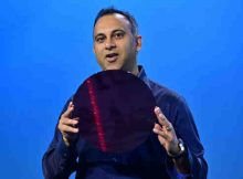 Navin Shenoy, Intel executive vice president and general manager of the Data Center Group, displays a wafer containing Intel Xeon processors during a keynote on Tuesday, April 2, 2019. Photo: Walden Kirsch / Intel
