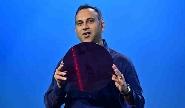 Navin Shenoy, Intel executive vice president and general manager of the Data Center Group, displays a wafer containing Intel Xeon processors during a keynote on Tuesday, April 2, 2019. Photo: Walden Kirsch / Intel