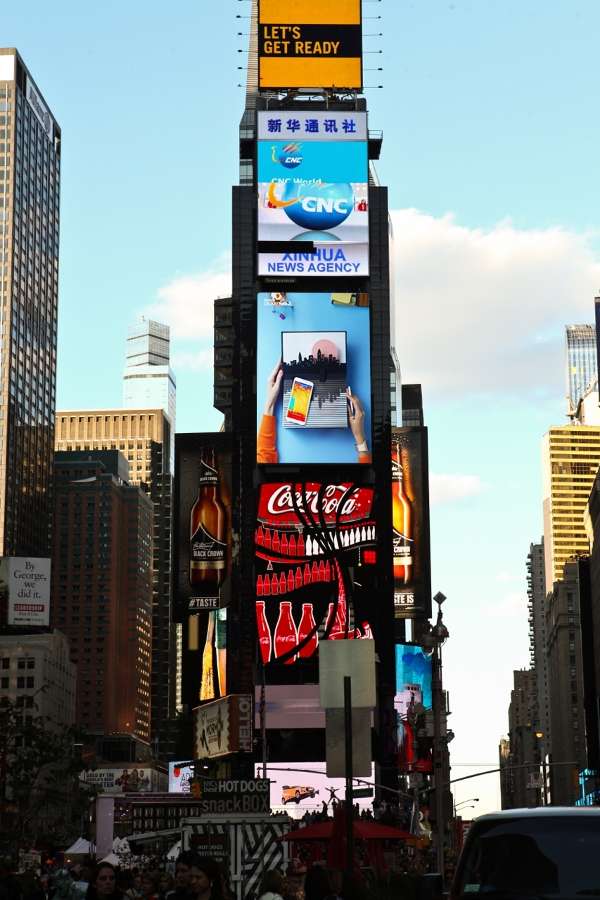 Benja Harney's colorful Galaxy Note 3 pop-up book advertisement captures the attention of Times Square.