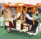 Narendra Modi taking a ride on e-Rickshaw, on the launch of 'Stand up India' programme, in Noida, Uttar Pradesh on April 05, 2016