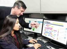 IBM's Chief Watson Security Architect Jeb Linton demonstrating to University of Maryland Baltimore County student Lisa Mathews how to teach IBM's Watson the language of security, Tuesday, May 10, 2016.
