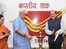 Manoj Sinha lighting the lamp to inaugurate the Dak Help Line, in New Delhi on September 12, 2016