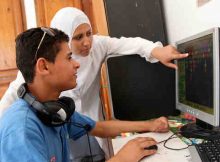 Innovators using a specialised computer. Photo: UNICEF/Giacomo Pirozzi