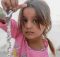 On 15 November, a young girl from Mosul takes water from a tap stand at a UNICEF-supported Temporary Learning Space in Hassan Sham Displacement Camp, Ninewa Governorate. “I like it here because we’ve been out of school for two years,” she said. Photo: UNICEF