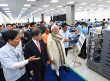 The Prime Minister, Narendra Modi and the President of the Republic of Korea, Moon Jae-in taking a tour of mobile factory in Noida, Uttar Pradesh on July 09, 2018