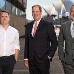 (L–R) James Manning (Co-Founder & CEO, Sharon AI), Chuck Robbins (Chair & CEO, Cisco), and Stefan Leitl (VP & General Manager, Cisco Australia & New Zealand) in Sydney. Photo: Cisco