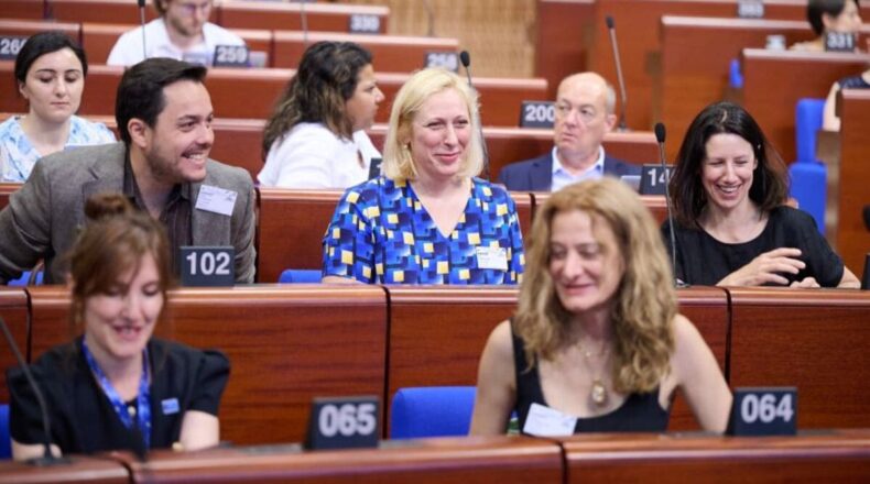 Stakeholders and educators discussing the future of digital citizenship education at a Council of Europe forum in Strasbourg.
