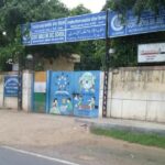 A large Delhi Government School building during the 2026 CBSE results period, where students and parents expressed concerns over On-Screen Marking (OSM) accuracy and digital grading errors.