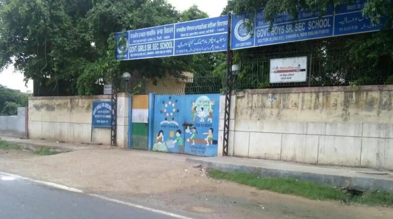 A large Delhi Government School building during the 2026 CBSE results period, where students and parents expressed concerns over On-Screen Marking (OSM) accuracy and digital grading errors.